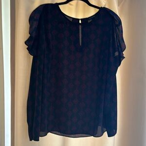 Black patterned Banana Republic, long sleeve blouse. Size small. Good condition.